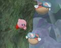 Kirby diving underwater (sans goggles) near two Blippers