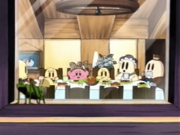 The Grasshopper Eavesdropper spies on Kirby as he eats with Mayor Len's family.