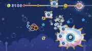 Star Shooter Kirby battling Kracko and avoiding Li'l Krackos in Kirby's Epic Yarn