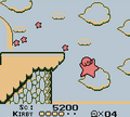 Kirby riding the first Warp Star in Green Greens, in Kirby's Dream Land