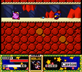 Kirby using the Ninja ability to defeat a Bio Spark in Kirby Super Star