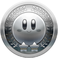 Silver Kirby medal used in Kirby's Return to Dream Land Deluxe