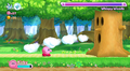 Whispy Woods using his Air Bullet attack in Kirby's Return to Dream Land