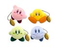 Set of four mascot plushies of differently colored Kirbys made of corduroy material