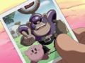 Bonkers holding a picture of him posing with Kirby