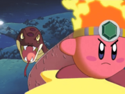 Fire Kirby coiling Heavy Anaconda around one of Castle Dedede's towers in Frog Wild