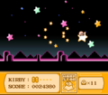 Kirby flies off into the distance on his Warp Star.