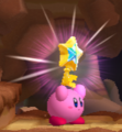 Kirby carrying a key in Kirby's Return to Dream Land