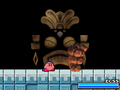 Kirby fighting Wham Bam Rock in Kirby Super Star Ultra