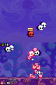 The Kirbys battle with Skullys for a Treasure Chest.