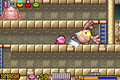 Kirby attacks some Golems in Radish Ruins.