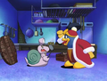 King Dedede attempts to subdue Escargoon and cook him.
