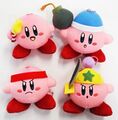 Mascot plushies of Kirby with the Star Rod, Bomb, Fighter and Ninja Copy Abilities