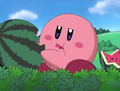 Kirby carelessly eats from the watermelon patch.