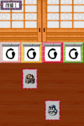 Screenshot of the Korean version of Kirby Card Swipe during play. Note again the replacement of the tatami mat with a plain wooden floor.