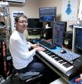 Hirokazu Ando's Office Pictured: Cubase Pro 8 Suzuki Andes 25F Suzuki Melodion Music Man Bongo 4HH Yamaha S80