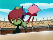 Kirby is attacked by Kung-Fu Lee.