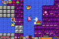 Some metal blocks in an underwater area in Kirby & The Amazing Mirror