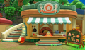 The outside of Waddle Dee Café, with Café-Staff Waddle Dee pictured behind the counter
