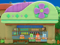 The outside of Waddle Dee's Item Shop, with Item-Shop Waddle Dee pictured behind the counter