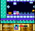 Kirby standing near a bunch of spikes in Kirby Super Star