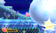 Kirby follows a giant snowball a little too close and gets grazed.