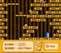 Kirby inches toward the Big Switch in the room ahead in a hidden cave.