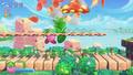 Kirby tackles some opponents on the bridges using the Leaf ability.