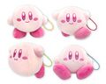 Four small "Mochi Mochi" plushies of Kirby, created for Kirby's 25th Anniversary