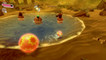 Battling the first set of enemies in a small pond at the start of the stage