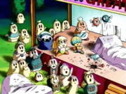 The gathered people watch as the monster explodes in dramatic fashion in the sky.