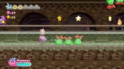 Kirby finds himself in the factory waterworks.
