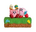 "Fun Memories" figure from the "Poyotto Collection Kirby 30th Anniversary" merchandise line, featuring a Kirby holding plushies of Tiff and Tuff