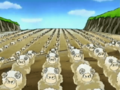 The sheep march in formation toward the castle.